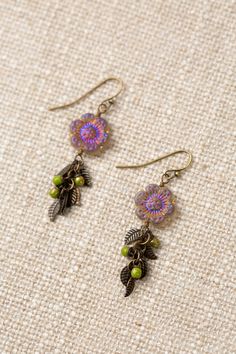 The Czech Glass Collection offers a varied selection of handcrafted earrings, including this cluster design featuring a Czech Glass flower and antique brass leaves for a casual look. Antique Brass (Lead & Nickel Free) Czech Glass 2" with antique brass ear wires We hand select our natural materials, thus there may be slight variations in color and/or size that will not detract from the overall aesthetic. Our unique handcrafted designer jewelry for women is made in America, each design created ind Czech Beads Jewelry, Floyd Va, Czech Glass Jewelry, Flower And Leaves, Beading Inspiration, Cluster Design, Handmade Clay Jewelry, Diy Jewelry Inspiration, Flower Leaves