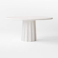 a white round table on a white background