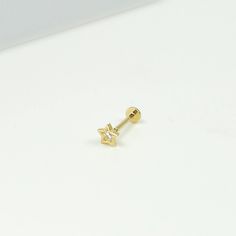 14K Solid Gold Tiny Star with CZ Internally Threaded Labret Stud Earring, Piercing Earring, Lobe Tragus Cartilage Helix Piercing, Tragus Stud Earring, Conch Stud, Flat Back Earring, Piercing Earring, Minimalist Earring, Simple Stud, Geometric Earring, Dainty Earring * Gold Kt: 14K solid gold * Available Gold Color: Yellow Gold * Star : 4mm * Bar Post Thickness : 1mm (18Gauge) * Bar Post length : 6mm * Bar Post length : 8mm * Flat Back Size : 3 mm * Every order comes with a gift box **This listin Celestial Star-shaped Piercings For Gifts, Celestial Star Piercings Gift, Celestial Star-shaped Piercings As Gift, Tiny Gold Star Cartilage Earrings, Gold Star Cartilage Earrings For Pierced Ears, Gold Star Cartilage Earrings, Gold Star Shaped Pierced Cartilage Earrings, Gold Piercings With Star Charm As Gift, Cartilage Helix Piercing