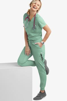 Our Women’s Scrub Top Is A V-neck Shape, With A Twist—the Neckline Has A Slight Curve And Stitching That Is Both Feminine And Flattering. Simple, Modern Styling Features A Single Front Pocket. Each Piece In Our Butter-soft Stretch Scrub Collection Was Designed For 12+ Hour Shifts, And Made From Easy-care, 2-way Stretch Comfort Fabric.. UA Butter-Soft STRETCH Women's 1-Pocket V-Neck Tuck-In Scrub Top - Size L Water Mint Cotton/Polyester/Spandex Comfy Scrubs, Scrubs For Women, Scrub Sets For Women, Scrubs Women, Best Scrubs Uniform For Women, Doctor Scrubs Women, Scrub Outfits Cute, Maternity Scrub Outfits, Stylish Scrubs For Women