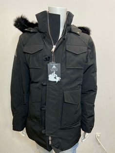 ARCTIC NORTH NWT MEN'S PARKA QUEBEC BLACK ON BLACK SIZE S Regular fit 100% Polyester Wind resistant shell and water proofed 80/20 white duck down 5 layers to insure warmth : shell/Baffle/Down/Baffle/Lining Genuine fox trim fur on hood Removable fur trim on hood Adjustable hood Arctic North metal logo on left sleeve. 2 way metal front zipper zipper on sleeve opening Buttons on front panel. Rib cuffs on sleeves 2 big front pockets with snaps 2 upper front snap pockets 1 inside zipper pocket Black Hooded Insulated Parka, Black Down Puffer Parka, Black Insulated Hooded Parka, Black Insulated Puffer Jacket For Cold Weather, Black Duck Down Parka With Pockets, Black Duck Down Parka For Cold Weather, Black Down Parka With Pockets, Casual Black Duck Down Parka, Black Down Parka With Detachable Hood