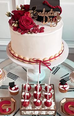 a cake and cupcakes on a table