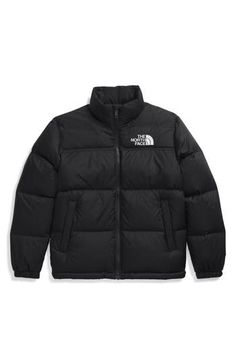 A retro North Face jacket based on a baffle-quilted, down-insulated design from 1996 offers unmatched warmth in cold weather. The durable ripstop shell with warm, lightweight insulation is perfect for backpacking thanks to its packable design that can be stowed in its own pocket. 22" length Front zip closure with chin guard Stand collar Elastic cuffs Front zip pockets Packs into pocket 57 g/m² ripstop taffeta with non-PFC durable water-repellent (non-PFC DWR) finish Lined, with 700-fill-power go Northface Puffer Coat, Boy Wishlist, Northface Puffer, North Face Puffer Jacket, North Face Kids, North Face Coat, Bf Gifts, Boy Gifts, Boy Outerwear