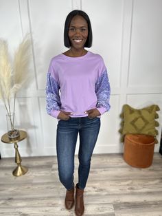 If you like this sweatshirt then don't think twice about getting it! Because The Don't Think Twice Sweatshirt from White Birch is going to go fast! The shimmering sequins on the sleeves are fabulous! It features contrasting long sleeves, round neckline and a straight ribbed hemline. The Don't Think Twice Sweatshirt is just the perfect pop of glam your wardrobe needs! Fabric: 100% Cotton Measurements: Bust (Size M): 25'' Bust (Size 2XL): 30'' Length (Size M): 26'' Length (Size 2XL): 27.5'' Missy Casual Crew Neck Sweater With Sequins, Casual Long Sleeve Sweater With Sequins, Casual Long Sleeve Sequin Sweater, Fall Crew Neck Top With Contrast Sequin, Fall Contrast Sequin Crew Neck Top, Fall Cotton Tops With Sequins, Fall Sequin Long Sleeve Sweatshirt, Sequin Long Sleeve Sweatshirt For Fall, Sequined Long Sleeve Fall Sweatshirt