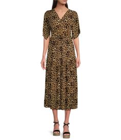 From Calessa&#x2C; this dress features:stretch printed mesh fabrication v-neckline short sleevessmocked waist straight hemline tiered pullover construction approx. 50" length polyester/spandex hand wash Imported. Fall Leopard Print Knee-length Midi Dress, Spring Leopard Print Knee-length Midi Dress, Casual Leopard Print Knee-length Dress, Fitted Leopard Print V-neck Midi Dress, Casual Leopard Print V-neck Midi Dress, Sporty Casual, Career Woman, Short Sleeve Dress, V Neckline