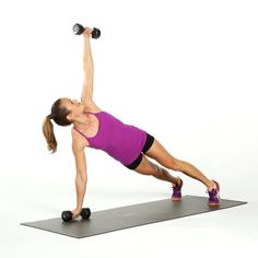 a woman is doing push ups with dumbbells