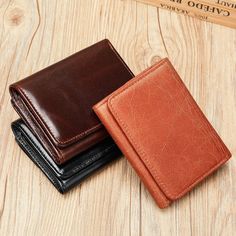 Genuine Leather Men's Wallet Slim Minimalist Trifold Purse High Quality Business Rfid Blocking Card Holder Coin Pocket Wallet Origin: Mainland China Lining Material: Polyester Main Material: Genuine Leather Genuine Leather Type: Cow Leather Material Composition: Cowhide Wallet Length: Short Style: vintage Model Number: 3256806075113792 Item Length: 11.5cm Item Type: Wallet Place Of Origin: China (Mainland) Item Width: 9cm Pattern Type: Solid Gender: MEN Wallets: Mini Wallets Vintage Men Wallet: Portable STYLE: Stay organized and stylish with this essential leather trifold wallet . This compact wallet is perfect for everyday use and fits in any pocket with ease. RFID TECHNOLOGY: Crafted with an interior lining of RFID blocking fabric, this wallet is designed to help shield credit card and p Cowhide Wallet, Rfid Technology, Leather Trifold Wallet, Compact Wallet, Men's Wallet, Wallet Organization, Purse Styles