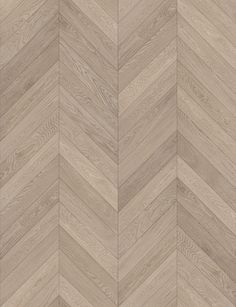 an image of a wood floor with chevroned pattern in beige and grey tones