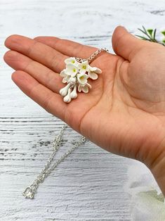 "Beautiful white lilac flower necklace for every lovely day. The life of the real lilacs is too short to make some necklaces with them. Instead of real flowers, I offer you these beautiful handmade that will never fade. Such a piece of floral jewelry can please you for many years. It will beautifully adorn your look in any season of the year. Details: * Designed with handmade flowers out of cold porcelain (air dry clay); * Lenght of the pendant is about 1.8 inches (4.5 cm); * Chain length is adj Poppy Necklace, White Lilac, Pink Rose Flower, Floral Jewelry, Lilac Flowers, Romantic Flowers, Floral Necklace, Purple Lilac, Floral Jewellery