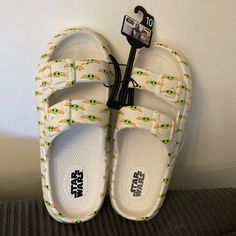 Super Cute And Unique Star Wars With Baby Yoda Sandals/Slides. Women’s Size 10 Very Cushiony And Soft, Yet Durable. Brand New! Fast Shipping! White Non-slip Slippers For Vacation, Fun White Flip Flops For The Beach, Fun White Flip Flops For Beach, Cute Open Toe Slides For Vacation, Trendy White Slide Flip Flops, Fun White Sandals For The Beach, Fun White Sandals For Beach, Trendy White Vacation Slippers, Fun White Beach Sandals