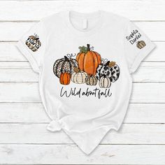 Pumpkin Fall Nana with Kids CTH01 T-Shirt Made from airy fabric, can be worn all year around, good sweat absorbing, wear at home, good sleepwear, or any sports activities. Great as Birthday gifts, any Holiday presents for loved ones or It's a gift to yourself. This adorable item can be designed upon anyone's wish with any title. Product details: Brand: Gildan Classic unisex cut makes this easy to fit the body. Material: Cotton Heavyweight Fabric. Sport Grey And Antique Heathers: 90% Cotton | 10% Hey Pumpkin, Holiday Presents, Pumpkin Fall, Home Good, Dark Grey Color, Personalized Clothes, Sports Activities, Fall Pumpkins, Custom Name