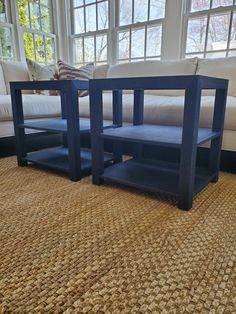 a coffee table sitting on top of a carpeted floor