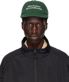 Cotton twill cap in green. · Embroidered eyelets at crown · Text embroidered at face · Flat brim · Cinch fastening Supplier color: Green Green Cotton Hat For Streetwear, Green Embroidered Baseball Cap For Outdoor, Green Dad Hat With Embroidered Logo, Green Embroidered Baseball Cap, Green Embroidered Logo Dad Hat, Green Visor Dad Hat For Streetwear, Green Curved Brim Baseball Cap For Streetwear, Green Baseball Cap With Logo Patch And Curved Brim, Green Cotton Snapback Hat With Curved Visor