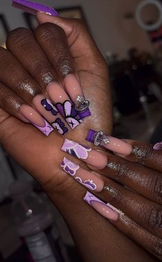 #kaws #nails #purplenails #colorpurple #acrylic #purple #kawsnails Acrylic Nails With Purple Design, Cartoon Character Nails Acrylic, Long Junk Acrylic Nails, Cute Purple And Black Nails, Kaws X Chrome Hearts Nails, Purple Xl Nails, Kaws Halloween Nails, Purple N Gold Nails, Purple Nails Asthetics