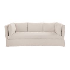 a white couch sitting on top of a wooden floor