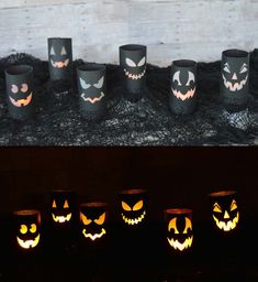 halloween pumpkins are lit up in black paper cups with faces carved into them and on the outside