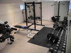 a home gym with weight machines and exercise mats