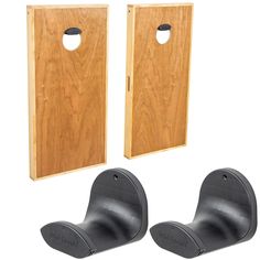 two wooden doors with black handles and one has a hole in the middle for each door