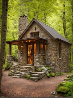 a small stone cabin in the woods