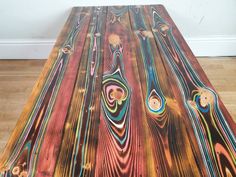 a table with colorful lines painted on it