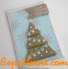 a card with a christmas tree on it