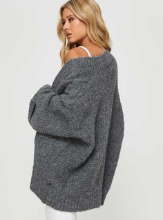 Oversized cable knit cardigan Drop shoulder, wide sleeves, folded back cuffs, twin hip pockets Good stretch, unlined  75% polyester 78% nylon 6% wool 1% spandex   Cold machine wash Oversized Solid Cable Knit Sweater, Oversized Cable Knit Long Sleeve Outerwear, Oversized Long Sleeve Cable Knit Outerwear, Oversized Knit Sweater Coat With Ribbed Cuffs, Oversized Textured Knit Cardigan, Oversized Gray Knit Outerwear, Gray Cable Knit Sweater Coat For Fall, Gray Chunky Knit Outerwear, Oversized Soft Knit Gray Outerwear