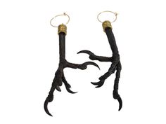 Real Crow Feet/Claws inside a Gold Pewter Cap on Gold Plated Hoop earrings. The Claws Measures 3" long and has been cleaned and disinfected.   Comes with a Organza Bag. Makes a nice gift! Wearing or carrying animal parts dates back more than 15,000 years and was believed to endow the wearer with the power of the creature.  Crows are said to be wise creatures with foresight. They are said to have the capacity to realize future happenings. Crow spirit animal is a symbol of transformation. Crows ca Crow Accessory, Vulture Culture Jewelry, Crow Species, Crow Earrings, Crow Spirit Animal, Animal Bone Earrings, Crow Trinkets, Animal Bone Jewelry, Carrion Crow