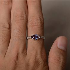 This is a gorgeous handmade creation. Its beauty is its simplicity & Elegance. The 5*7 mm oval shape faceted lab alexandrite is crafted in solid sterling silver and with rhodium plated. All item is sent in a beautiful gift box If you have any idea of design your ring,pls contact me directly. You can realize more lovely stuff clicking the link https://www.etsy.com/shop/knightjewelry?refshopsection_shophome_leftnav Please leave the correct address and you phone number for delivering successful June Birthstone Ring, Alexandrite Ring, June Birthstone, Ring Color, Ring Oval, June Birth Stone, Ring Wedding, Beautiful Gift Boxes, Birthstone Ring