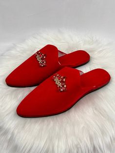 Moroccan Women's Babouche Slippers: Exquisite High-End Red Babouches, Chic and Elegant in 100% Genuine Suede. All our leathers and suedes come from the traditional tanneries of Fez, Morocco. 👉✨ Discover the entire collection of Women's Babouche Mules: [Herima Etsy Shop](https://www.etsy.com/fr/shop/Herima?ref=l2-about-shopname&section_id=47979178) MATERIALS: - Premium quality sheep suede lining. - Rigid calfskin sole, suitable for outdoor use. - Decoration (Rhinestones). SIZE SELECTION TIP: Due Evening Red Mules With Red Sole, Red Mules With Red Sole For Evening, Elegant Red Closed Toe Mules, Moroccan Shoes, Red Mules, Moroccan Slippers, Bridal Slippers, Babouche Slippers, Moroccan Women