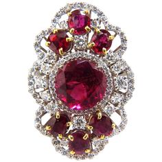 GIA 3.53ct. Natural Purple Red Tourmaline "Rubellite" Ring. GIA Report # 5161992428 Stating: Transparent & Purplish Red. 3.00ct. Natural (6) Rubies. Oval Cut, Clean Clarity. Diamonds: 1.50ct. Vs-2 Clarity, G-color 18kt. White gold 13 grams. depth of ring: .38 inch deck of ring: 1.26 X .86 inch current ring size: 7.5 can be resized please inquire $12000 appraisal will accompany & GIA Cert. Ruby Tourmaline, Rubellite Ring, Red Tourmaline, Fancy Yellow Diamond, Ruby Diamond Rings, Ruby Jewelry, Tourmaline Ring, Ruby Diamond, Diamond Cluster Ring