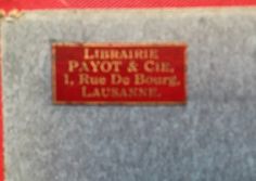 there is a red sign that says library payot & cle 1 rue do bourre lacrianne