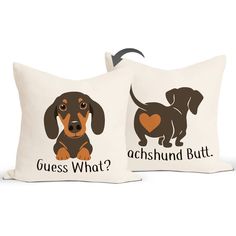 two pillows with dogs on them that say guess what? and the other says,