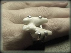 "*PLEASE NOTE THIS RING IS NOT YET MADE AND IS COMMISSIONED TO YOUR SPECIFIED SIZE- The first one I did like this was an alchemy request and came out so lovely, that I am now offering them permanently. Your ring is made to order with you letting me kow your size & you picking from our stock of coyote molars. Your setting will be similar to the one in the photos- It will have 4 prongs that will conform to the shape of the tooth- but since each tooth varies somewhat it will not be identical to Tooth Ring, Molar Tooth, Wolf Teeth, Teeth Jewelry, Alchemy, Prong Setting, Statement Rings, Heart Ring, Sterling Silver