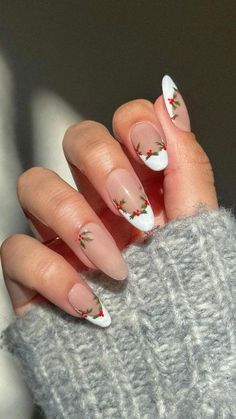 Here are some simple yet festive Christmas nail ideas that are easy to achieve: Red and Green French Tips: Instead of the classic white tips, use red or green polish for a festive twist on the French manicure. Snowflakes: A pale blue or white base with simple snowflake designs using a thin brush or nail art pen. Candy Cane Stripes: Use red and white stripes on a couple of accent nails, and keep the rest a solid red or white. December Nails, Nagel Tips, October Nails, Cute Christmas Nails, Christmas Nails Easy, Christmas Gel Nails, Christmas Nails Acrylic, Thanksgiving Nails, Red Nail