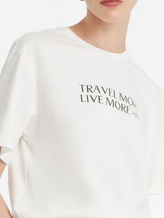 -Cotton fabric   -Simple and versatile   -Soft and comfortable   The t-shirt is a staple piece that combines comfort with a laid-back style. Crafted from pure cotton fabric, it ensures breathability and a soft touch, making it exceptionally comfortable for all-day wear. The simplicity of the T-shirt, adorned with a chic letter print "Travel More, Live More", gives it a versatile edge, allowing it to be easily paired with various bottoms for different looks.   Pure Cotton Chic Letter Printed Wome Everyday Tan Cotton T-shirt, Spring Organic Cotton Tops With Logo Print, White Comfortable Relaxed Fit T-shirt, Organic Cotton White T-shirt With Slogan, White Organic Cotton T-shirt With Slogan, White Relaxed Fit Comfortable T-shirt, Everyday Cotton T-shirt With Text Print, Comfortable White Cotton T-shirt, Everyday Cotton T-shirt With Logo Print