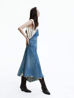 MO&Co. Women's Irregular Hem Denim Dress Overall denim dress takes traditional elements and updates them in original ways. This midi dress is constructed from organic cotton, its modern asymmetrical hem and distressed detailing add a unique touch to your silhouette. Features : - Regular fit, midi overalls silhouette- Asymmetric hem with distressed- Non-adjustable straps, pocket detail Code: MBD1DRST15The back length of size S is 104.5cmMATERIALS & CARE Material: 100% CottonPlease put it into a m Overall Denim Dress, Irregular Hem, Mesh Bag, Asymmetrical Hem, Denim Outfit, Pocket Detail, Asymmetric Hem, Denim Dress, Blue Dresses