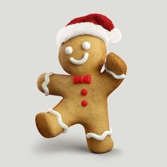 a gingerbread man wearing a santa hat