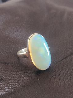 Beautiful Natural Opal Ring  Made with Sterling Silver 925  Handmade Ring  Made in india Ring  Gemstone Size: 22x14 MM Top Quality Natural Opal Ring made with Sterling Silver 925 lovely Ring with nice workmanship Spiritual White Oval Opal Ring, Hallmarked Oval Ethiopian Opal Rings, Oval Ethiopian Opal Moonstone Ring, White Oval Ethiopian Opal Rings, White Ethiopian Opal Ring For Formal Occasions, White Ethiopian Opal Oval Rings, Formal White Ethiopian Opal Ring, Spiritual Oval Opal Ring, Natural Opal Ring