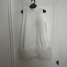 Adorable White Mini, High Neck, With Feather Trim Purchased As An Option For Bridal Activities But Never Ended Up Wearing It. Super Cute, Flirty And Fun! Chic White Dress With Feathers, Chic White Mini Dress With Feather Trim, Elegant White Mini Dress With Feathers, Elegant White Feathered Dress, Sleeveless White Dress With Feathers, White Sleeveless Dresses With Feathers, White Feathered Mini Dress For Cocktails, White Feathered Mini Dress For Cocktail, White Sleeveless Dress With Feathers