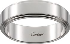 a stainless steel ring with the word carrier engraved on it's center and sides