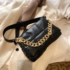 • Main Material: PU• Closure Type: Hasp• Lining Material: Polyester• Number of Handles/Straps: Two• Interior: Cell Phone Pocket• Decoration: Chains• Item # 49176712• Size: 15"W x 9"H x 4"D• Import Product• Shipping Worldwide Leather Shoulder Bag With Gold Chain For Party, Trendy Leather Bags With Gold Chain, Chic Faux Leather Shoulder Bag With Chain Strap, Trendy Leather Bag With Chain Detail, Evening Shoulder Bag With Chain Strap In Faux Leather, Evening Faux Leather Shoulder Bag With Chain Strap, Rectangular Faux Leather Shoulder Bag For Fashion, Leather Bags With Chain For Night Out, Leather Bag With Chain Strap For Fashion