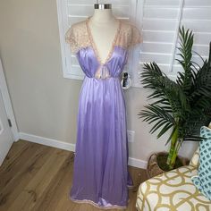 Stunning Vintage Night Gown from Diamond Cut Lavender with stunning lace detail. Still has tags attached!! Made in Australia.  Vintage Size 16 Measurements: Pit to Pit- 20" * Waist- 18" * Length- 56" Fitted Sleep Gown With Lace Trim, Fitted Lace Trim Sleep Gown, Lace Trim Sleep Gown, Purple Lace Sleepwear For Loungewear, Purple Sleepwear With Lace Trim For Night, Purple Sleep Dress With Lace Trim, Purple Lace Trim Sleepwear For Bedtime, Purple Lace Trim Sleepwear For Night, Purple Lace Trim Nightgown For Bedtime