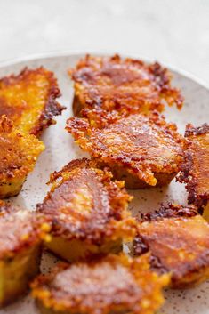 some fried food is on a white plate