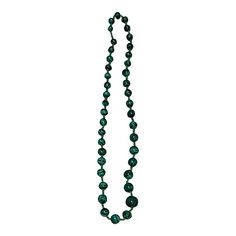 This is part of Chairish’s Costume Jewelry assortment.  Graduated Malachite partially beaded. Purchased in the 70's from the Zaire (now the Congo). It is hand strung uniquely without a clasp. Emerald Beaded Necklace With Round Gemstone Beads, Handmade Emerald Beaded Necklaces With Round Beads, Green Turquoise Necklace With Round Beads In Vintage Style, Green Jewelry With Wooden Beads, Healing Malachite Beaded Necklaces With Round Beads, Artisan Green Single Strand Beaded Necklace, Adjustable Beaded Malachite Necklaces, Green Vintage Jewelry With Wooden Beads, Green Wooden Beads Jewelry