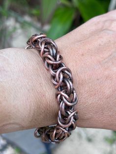 Unique hand fabricated Byzantine chain maille bracelet entirely by myself from upcycled solid copper wire.  The rings are hand cut and then assembled together using a  Byzantine chain maille pattern.  An antique patina was applied to the metal using Liver of sulfur and a thoughrough hand polish finish was given to make details stained out.  * fits up to size 9 * sustainable * upcycled  * handmade * hand polish finished * gift box * complimentary polishing cloth included  * small business  Please make sure to select the right fitting size of bracelet in the drop box before checking out.  🌺 Handmade with love and Aloha on Kauai 🌺 Chain Maille Patterns, Copper Chain Bracelet, Chain Maille Bracelet, Byzantine Jewelry, Jewelry Recycled, Chainmail Bracelet, Byzantine Chain, Chainmaille Bracelet, Large Bracelet