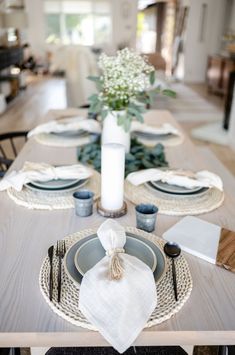 the table is set with place settings for four