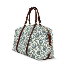 • Blue Damask Bag: Features a luxurious and elegant blue damask pattern, inspired by 14th-century designs.• Damask Travel Bag: A stylish and functional travel bag adorned with a timeless damask print, perfect for those who appreciate vintage elegance.• Elegant Damask Duffel Bag: Combines classic design with modern functionality, making it an ideal choice for sophisticated travelers.• Vintage Style Bag: Captures the essence of historical fashion with its ornate damask pattern, offering a unique a Elegant Rectangular Duffle Bag For Weekend Trips, Elegant Rectangular Bag For Weekend Trips, Elegant Rectangular Bags For Weekend Trips, Blue Travel Bag With Removable Pouch For Weekend Trips, Blue Rectangular Bag With Luggage Sleeve, Elegant Rectangular Travel Bag For Weekend Trips, Blue Rectangular Bag For Overnight Trips, Blue Shoulder Bag With Removable Pouch For Weekend Trips, Elegant Rectangular Shoulder Bag For Trip