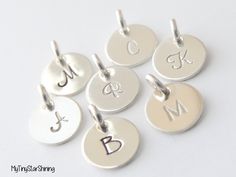 This listing is for one of these tiny Round Initial Simple and stylish this initial pendant is fashioned in fine sterling silver. The disc-shaped pendant can be customized with one engraved Script or Block initial. ★*Sterling silver Disc : 3/8 Inch ( 9.5 mm) Chain not include) Back to my shop : http://www.etsy.com/shop/mytinystarshining Sterling Silver Initial Pendant Charms For Anniversary, Sterling Silver Initial Pendant Charms For Personalized Gifts, Personalized Silver Charm Necklaces With Initials, Silver Sterling Initials Charm Necklace, Silver Sterling Initials Charm Necklaces, Silver Sterling Silver Initials Charm Necklace, Silver Charm Necklaces With Initials For Personalized Gift, Silver Monogram Pendant Charm Necklace, Sterling Silver Initials Charms For Gifts