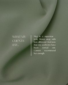 the back side of a green fabric with white writing on it and an image of what is