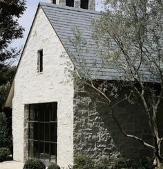 an old stone building with a clock tower